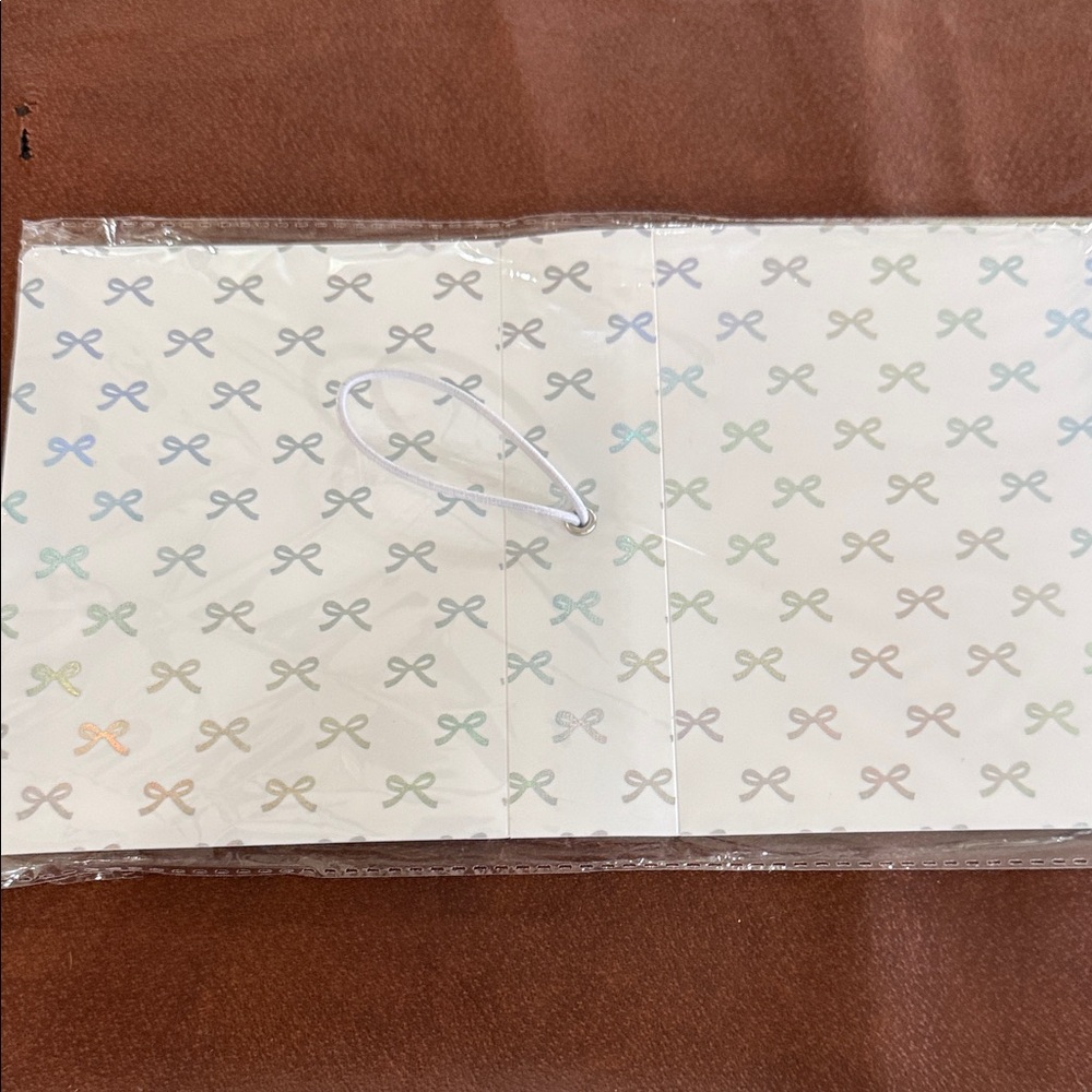 Clear Bow-Print photo album with Holographic Accents